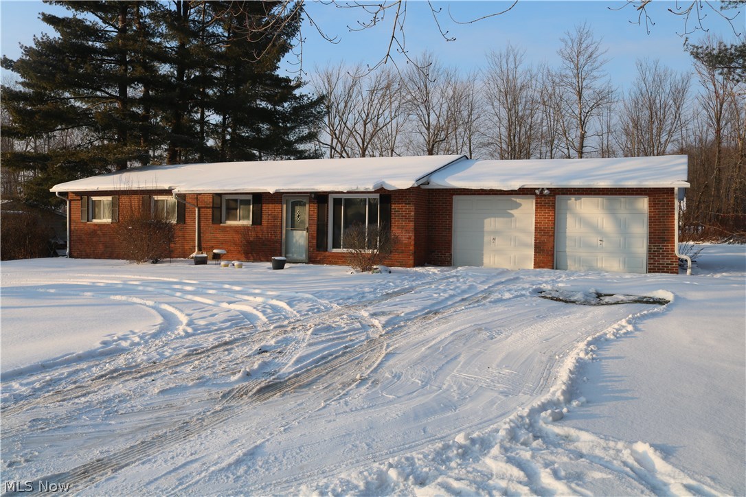 3 bedroom updated brick Ranch nestled on a quiet dead end street is ready for immediate possession. This all brick ranch features an attached 2 car garage, updated kitchen, and so much more! New roof, central air, and hot water tank in 2014! Schedule your showing today before this one is SOLD!