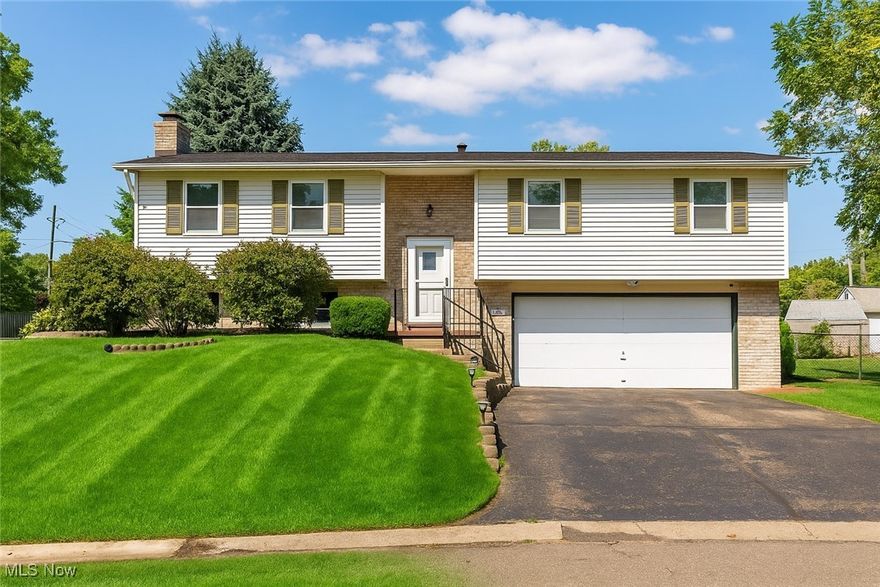 Welcome to 825 6th St. NE, a beautifully updated home in the highly sought-after North Canton School District on a dead end street. Conveniently located near Dogwood local park, trails and schools, this 3-bedroom, 2-bath home combines comfort, style, and modern upgrades throughout. Step inside to find a fully remodeled kitchen (2019) featuring new cabinetry, solid surface countertops, tile backsplash, a breakfast bar, and sleek LG appliances. The open layout flows seamlessly, highlighted by updated light and sink fixtures, ceiling fans, and a modern thermostat.  The lower level is a true retreat with a dedicated media/theater room, perfect for movie nights or game days. Access to the backyard is from the main floor sliding glass door to the deck or the man door through the garage on the lower level. 
Major updates give peace of mind, including a new roof, furnace, and air conditioner (2022), a radon mitigation system (2020), and a new garage door motor and tension cables. Many more updates including fully remodeled kitchen and appliances, lighting and paint. 1 year Warranty provided by seller- America's Preferred Home Warranty. 
Outside, enjoy a fenced backyard ideal for pets, play, or entertaining, along with a spacious 2-car garage for added convenience.
1 Year Home Warranty included. 
Don’t miss this move-in ready gem in a prime North Canton location!