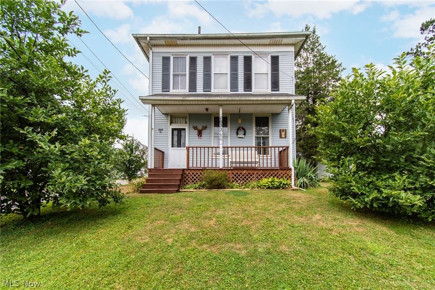 Wow! You won't want to miss this one! Located in United Local Schools, this lovely Victorian has been tastefully remodeled while preserving its historical charm. Situated on a double corner lot in the heart of Hanoverton, this home features an oversized two-car garage with an additional attached outbuilding measuring 24 x 44 feet, boasting 14-foot-high ceilings. For added convenience, a first-floor laundry with ample storage and a half bath are located on the main level. The spacious galley kitchen has its own entryway stepping onto the generously sized freshly stained back deck. The living room boasts soaring 10-foot ceilings with gorgeous windows allowing tons of natural light to fill the first floor. The dining area features a charming bay window with new vinyl flooring. Upstairs, you'll find 3 bedrooms and 1 full bathroom, all freshly painted with new carpet or stained finished floors. The bathroom has been remodeled with a new utility cabinet sink and bathtub wall insert. Many updates have been made to the mechanical features including a new HWT in 2023, new PEX piping throughout, a new pressure tank, and submersible pump. Brand new natural gas lines have been installed into the home, and the central A/C unit is less than 10 years old. The home also features a 100-amp electrical service box and a Lennox furnace. Carpet and vinyl floors were redone in 2022. The age of the roof is unknown. Utility bills average $50 for gas and $140 for electric per the homeowner's records. Don't wait to schedule your showing and see the gorgeous landscaping throughout the property, including a secluded garden behind the garage. A huge side yard with a swing set is also included. The home has plenty of curb appeal with a cozy covered porch at the front. There are plenty of parking spaces out back with a partially covered deck that can host plenty of seating for guests. The list goes on and on... This one is absolutely a must-see!!