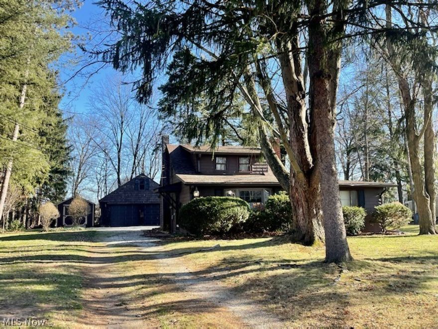 Incredible opportunity to get a 1.387acre yard in North Olmsted with a large garage with loft! The sellers father kept 3 cars and a tractor in the garage. This charming "cottage style" cape cod home is great for a first-time homebuyer! The room on the first floor that could be used as a bedroom or office.  The bathroom has been recently updated and is also on the first floor. Seller just installed brand new carpeting in the family room, upstairs bedrooms and stairs. He also installed a new fridge and microwave (2022), added a new backdoor, added new gravel to the driveway, painted the entire interior, added some new lighting fixtures, and MORE!  The family room is a spacious 15x27 carpeted space that features a centered wood burning fireplace and beams across the ceiling. The shed was built sometime in the last 5 years. A couple sections of windows are replacement windows, but most are original.  Due to that and that there are some spots on the exterior house that need painted, seller