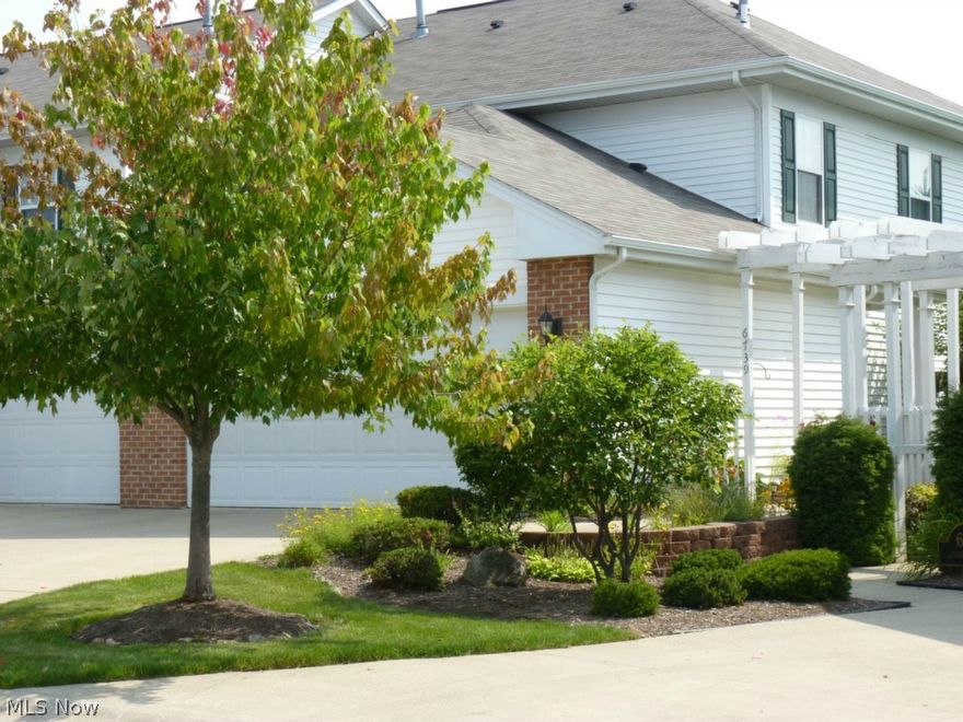 TWO CAR attached garage, 2 bedroom Town Home in a great location! Inside, you'll be pleased with the modern decor, clean neutral colors and fresh look! All appliances stay, including refrigerator, stove, dishwasher, built in microwave, washer & dryer. Master Bedroom has vaulted ceilings and loads of closet space. Additional closet organizers installed in each bedroom for maximum storage! Clean neutral carpet throughout. Great room is very open, w/optional dining room area. Covered deck stained summer 2014. $105/month Maintenance Fee. Crystal Lake offers nice picnic area/playground and location to highway, rec center, shopping is fabulous!