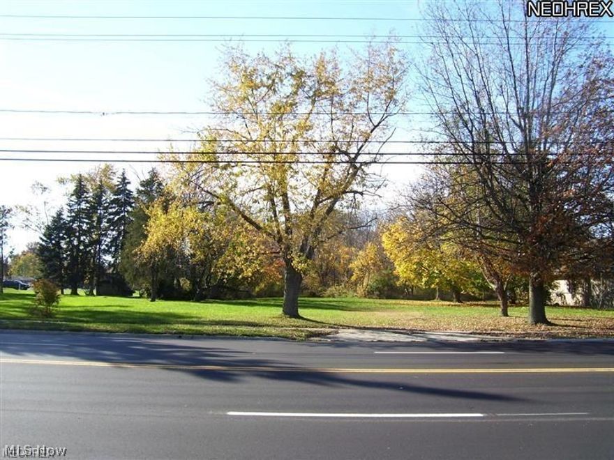 Very nice evenly rectangular size vacant parcel of land is 1.29 acres, 100 foot frontage by 561 deep both sides, and with all improvements in place, partially wooded approximately 2/3rds to the rear, cleared approximately front 1/3rd near the road. A home formerly sat on this site, which was recently razed. Curb cut for driveway apron remains ready for access to the property. All utilities are curbside. This property is located just north and contiguous to Rebmans Bowling & Recreation Center, and is just 3 blocks North from Cooper Foster Park Road and Amherst City Limits. Zoned commercial, ideal for freestanding building, medical arts, retail, etc...