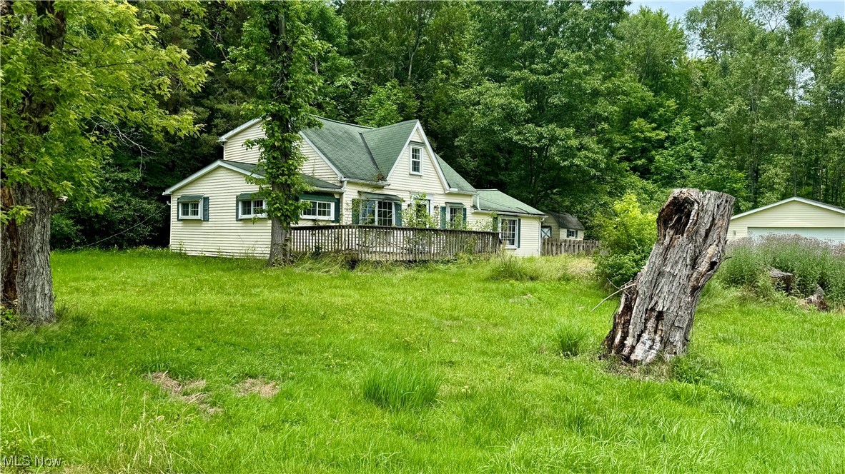 This is a tear-down and rebuild on a beautiful lot with a 2-car detached garage with electric and a concrete floor. Shed and fenced yard. Septic was updated with an aeration/chlorinator. Stainless pump for well 1 HP. This is a private lake community featuring a covered pavilion and community center. 1/2 mile from beautiful Bear Town Parks. Kenston Schools.