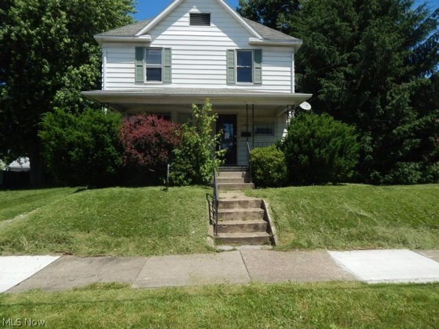 This home features a double lot each have 40-foot frontage and 110ft deep. There is an inviting porch for summer, 1 car garage, and a half bath on the first floor as well as a full bath on the second. This home needs work to make it your own, or a nice addition to your rental portfolio.