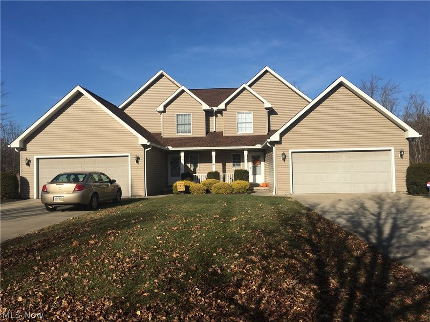 Wonderful duplex in Tallmadge. Each unit has a first floor master suite! There are 3 bedrooms, 2 1/2 baths, 2 car garage and first floor laundry each unit. The total square footage is 2827 +/-. Wonderful front porch. All appliances stay. Private setting and great location!