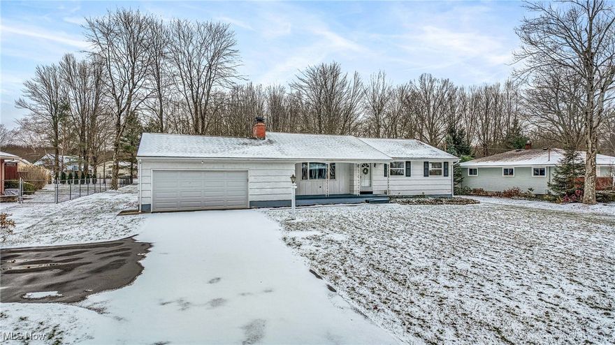 Make this charming well maintained ranch home in Howland yours! The owner built this home and the craftmanship is evident throughout, including the crown molding and hardwood floors. The entrance leads to a large living room with a picture window providing natural light and a beautiful wood burning fireplace. Adjacent to the living space is a dining room leading to the large four season, heated sunroom. The kitchen provides ample working space and pull-out drawers in the cabinets. The washer/dryer unit can be connected in the kitchen to provide all necessities on one floor and appliances stay with the home. The primary bedroom includes an attached bathroom, with an additional full bathroom located on the first floor. All bedrooms have hardwood floors. The sizable finished living space in the basement includes a wood burning fireplace to keep things cozy. The large lot provides privacy and plenty of space for enjoying the outdoors including a shed for additional storage. An attached two car garage leads into the kitchen allowing for easy access out of the weather. Located in Howland Schools and near major roads affords easy access in all directions.