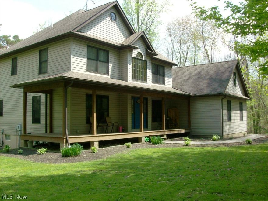 Want to blend in with the crowd? Do you want a home that looks like every other home in the neighborhood? Most of all, do you absolutely hate privacy? If you like to look out your window and see your neighbor looking back at you, don't bother looking at this home. If you want a custom home on a private 3.66 acre oasis, surrounded by nature then you have just found your home. Pictures say more than words, so please review the photos and return to this section. Done? Okay, where to start? How about the first floor: Contemporary open floor plan - You see the magnificent great room with a wall of windows with a 2 story stone fireplace between them. Then there is the spacious Kraftmaid kitchen with composite counter tops, ceramic tile and matching stainless steel appliances, and a formal dining area. Coveted first floor master bedroom suite features a beautiful view of the woods, master bath suite with shower and jetted garden tub, large vanity, and walk in closet. There is also first floor