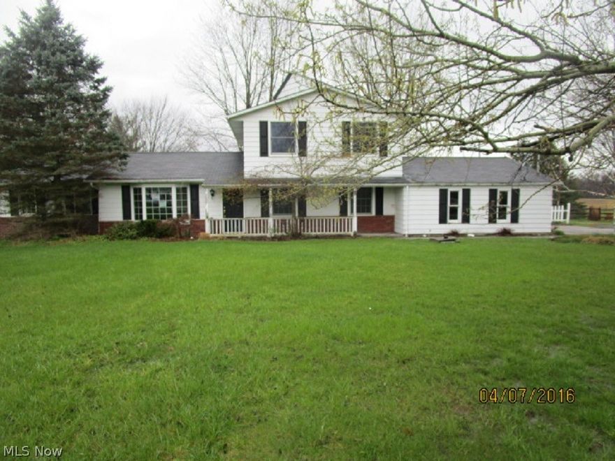 Country living at it's finest! Large lot (over 1.1 acres) is surrounded by open land. Front porch entry. Formal living room flows into formal dining room. Family room with vaulted ceilings and fireplace. Country kitchen with tons of cabinets and casual dining area complete with red brick fireplace. Custom sliders lead out to a fantastic, fully-enclosed solarium with beamed, vaulted ceiling and outdoor access to custom wood deck in rear yard. Spacious bedrooms. One bedroom on main floor would be ideal office. Three bedrooms upstairs with tiled full bath. Main floor laundry/utility room and direct access from oversized 2-car garage. Property also has a outbuilding used as garage, additional workshop or storage. Serene and private location, yet convenient to shops and highways. Quality Keystone Schools. Needs some TLC and updating, but don't miss out on this beauty! Property was built prior to 1978 and lead based paint potentially exits.