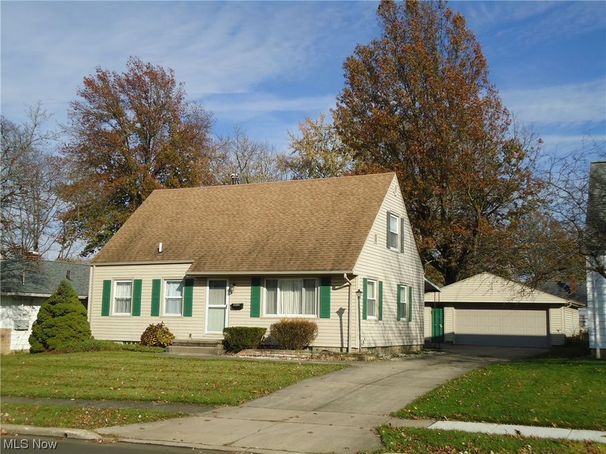 Larger than it looks!  Well kept 3/4 BR--2 BTH Cape in convenient Falls location.  Open floor plan with large Living room.  Spacious bedrooms with loads of storage.  Applianced kitchen.  Hardwood flooring under carpet throughout most of the home.   Roomy basement Rec room.  Newer furnace and Central air.  
2 car Garage and covered patio overlooking the nice, partially fenced yard.  Laundry area with washer and dryer included.