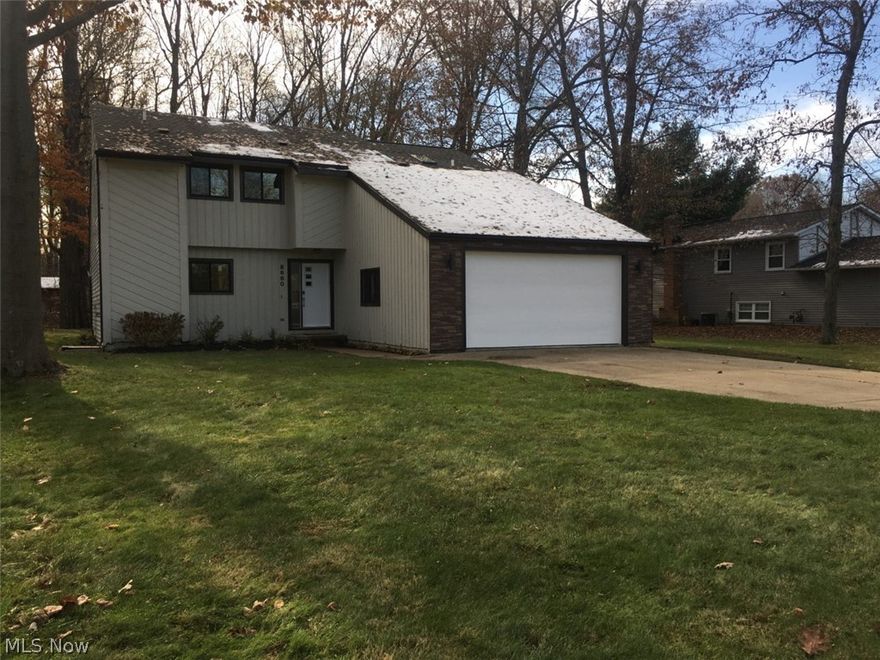 MOVE IN READY!  Unique & RARE!  Great South Mentor Location!  Minutes from I-90 and Mentor Ave! This home has been completely remodeled!  New energy efficient dual pane double hung windows, new doors and trim throughout, new stone countertops, low maintenance and waterproof vinyl plank flooring, 60 oz. carpet, cabinets, vanities, faucets, LED fixtures, garbage disposal, laundry cabinets, sump pump, bathtub, shower, skylight, and more! $10's of $1,000s in upgrades!  Materials are upgraded!  Full basement is completely finished, including a bonus room that can be a 5th bedroom or game room!  This home includes lots of storage space!  Completely new kitchen includes new stainless steel, upgraded appliances, 36" high upper cabinets, 8 ft. kitchen island, and plenty of storage!  The laundry room / mud room is on the main floor right off the 2-car garage.  Attached to the kitchen is a large deck, ready for easy entertaining!  Sitting on 0.46 acres, this home has a large, private backyard wit