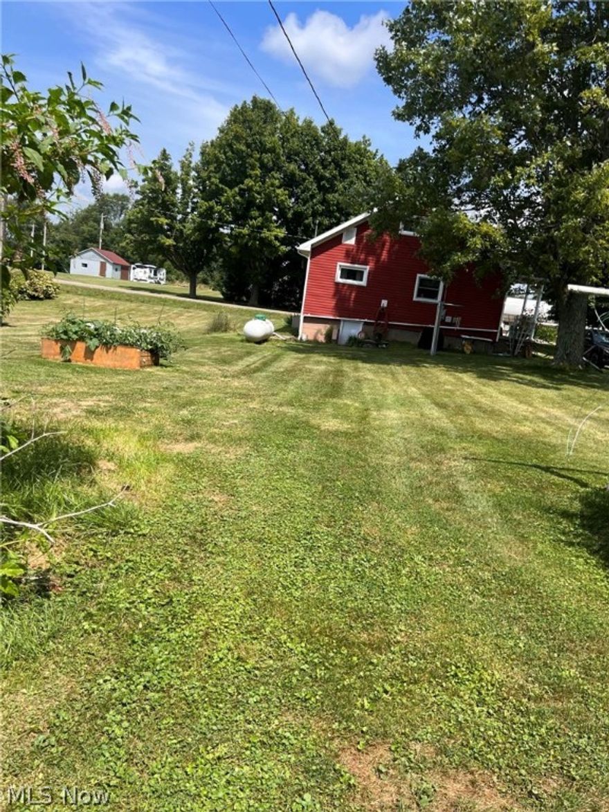 Take a look at this Cape Cod home sitting on 6 parcels for a total of 1.5 acres of flat yard that is perfect for all your outside needs. In this updated home you will find an eat-in kitchen with island sitting and updated painted cabinets, backsplash, and new flooring. The living room is large with hardwood flooring. Main floor laundry with stack washer and dryer to stay with the home and a main floor full bath keeps everything conveniently located on the main floor. Upstairs you will find 2 additional bedrooms with hardwood flooring. There is a full basement with plenty of storage for all your needs. The 2-car garage has electric and concrete flooring along with 2 additional storage sheds for all your extras! The exterior has ornamental trees and flowering shrubs, along with many perennials to have color blooming all summer. East Guernsey LSD. No mineral rights.