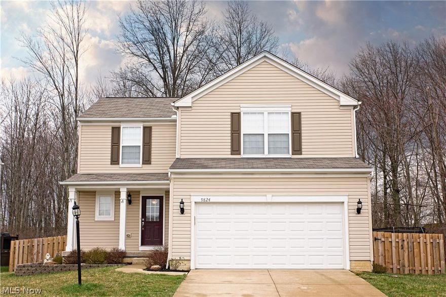 Beautiful newer colonial on the wooded view side of the highly sought Woodgate Farms development. Right when you walk into this spacious home you will be very impressed with the open layout. The living room offers great space to hold of your entertainment needs or just cozy up next to the fireplace. Walk right into the kitchen that features a well sized island for preparing meals and use as a breakfast bar. Conveniently located washer and dryer as well as attached garage door access are on the main level. Walk upstairs to the gorgeous master bedroom that has a walk in closet and a private master bathroom. There are also three additional spacious bedrooms as well as a full bathroom upstairs. Entertainers dream basement with a finished area with updated lighting and a full bar. The backyard features a paved patio as well as great views for entertaining and grilling out. Fenced in backyard for convenience with pets and privacy. This one will not lest, schedule your private showing today!