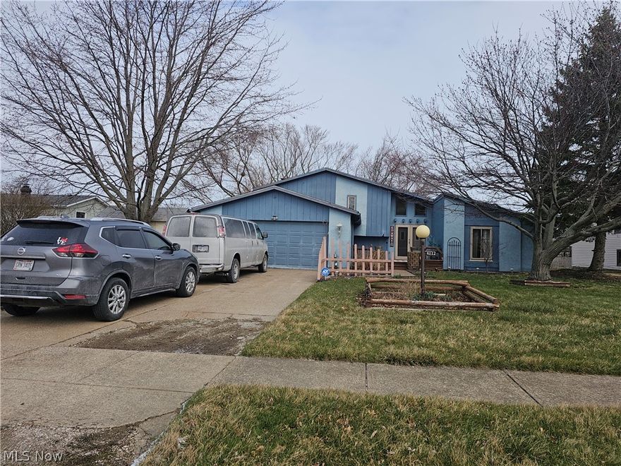 Spacious Split-Level with Great Potential in Lorain!

Bring your ideas and a little elbow grease to make this spacious 4-bedroom, 2-bath split-level home your own. One of the larger homes in the neighborhood, this property offers plenty of living space with vaulted ceilings in the main entrance, front room, and dining area that create an open, airy feel.

The layout provides room to spread out, featuring generously sized bedrooms, a large back deck, and a fenced-in backyard that’s perfect for outdoor enjoyment. The 2-car garage is a great bonus, offering ample storage and convenience. The home is dated but livable, allowing you to move in and update over time at your own pace.

This home is priced below market value to reflect the need for cosmetic repairs and TLC, and offers a great opportunity for someone comfortable with doing their own updates. With good bones, tons of space, and strong potential, this Lorain split-level is ready for its next owner to make it shine again.