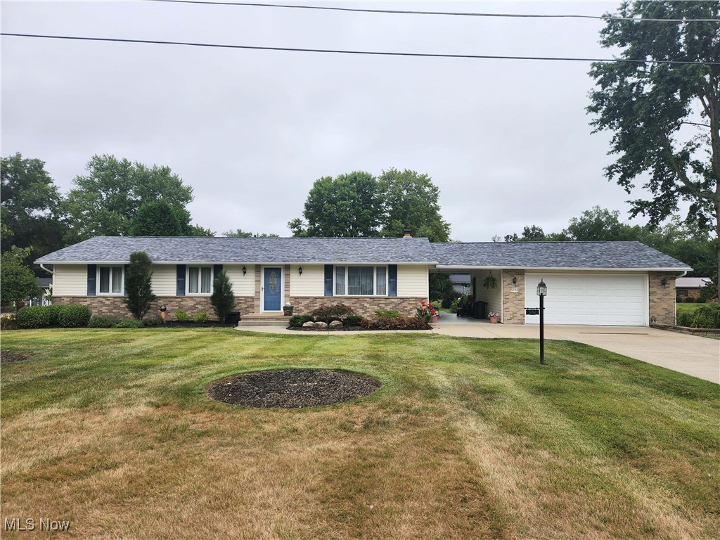 Welcome to this charming, well-maintained 3-bed, 2-bath home on an extra lot! This home has been wonderfully cared for and offers 1,296 sq ft of living space on the main level, plus an additional 259 finished sq ft in the basement – perfect for a home office, guest suite, or bonus room. This property offers plenty of space for expansion, gardening, or simply enjoying the open space. The property also features a 2-car garage, a convenient breezeway, and a lovely brick patio ideal for entertaining or relaxing outdoors. Inside and out, the property has been meticulously maintained, with professional landscaping completed annually to keep the curb appeal top-notch! Whether you’re looking for move-in-ready comfort or a property with room to grow, this home has it all.