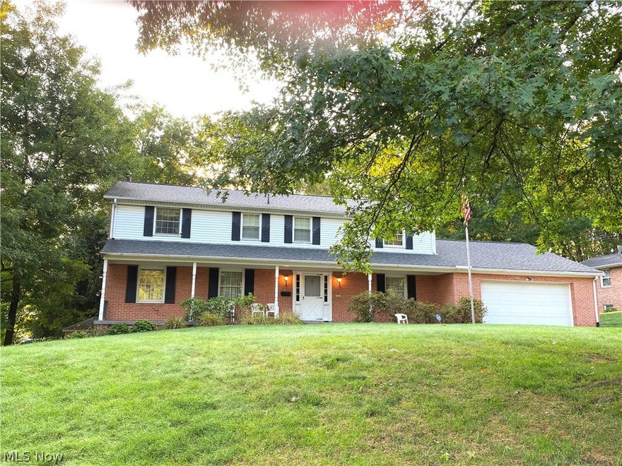 Weber built, quality home with amazing finishes! Nice spacious kitchen and dinette, formal dining room and living room with fireplace. Huge mudroom / laundry on first floor. New 5' walk-in tile shower in master bathroom. Walk-out lower level with rec room, 2nd fireplace, wet bar, fifth bedroom or office, and full bathroom. New roof in 2013 and H2O heater in 2020. Beautiful park-like private 1/2 acre lot, backs up to City property