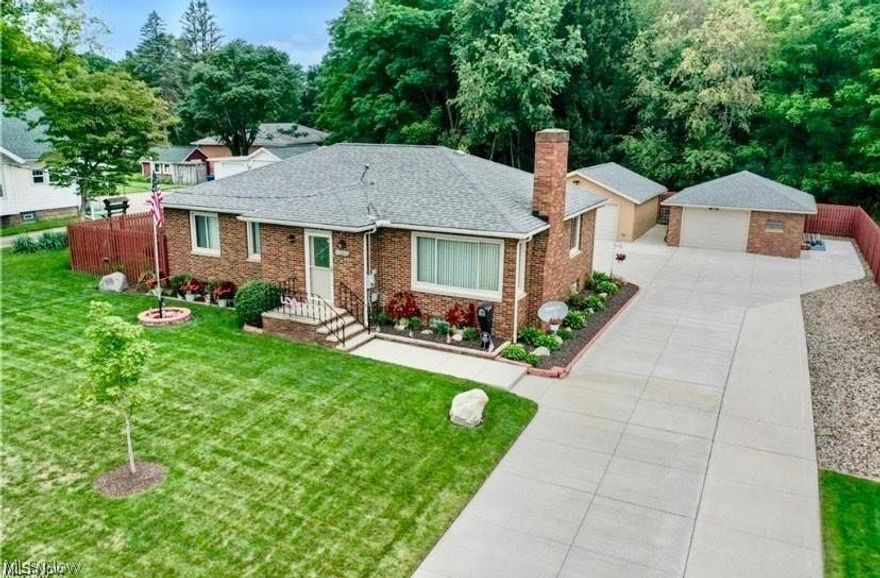 Excited to present this three-bedroom, two full bath brick Ranch in the beautiful city of Kent! The first floor gives way to a kitchen, dining room, living room with fireplace, full bath, and three 1st floor bedrooms! The large 1,052 sq. ft. basement is finished with high ceilings and plenty of light, has a full additional kitchen, full bath, laundry room, and plenty of storage. Fantastic home to entertain! The rear of the property has (2) two car garages, enclosed patio, bbq area, and a fenced in backyard. This is truly a unique property, that seems to have it all! There is an in-law suite in the basement. Also perfect for any small business. Please read the Home Improvements and Updates supplement, too many to list here. Book your showing today!
