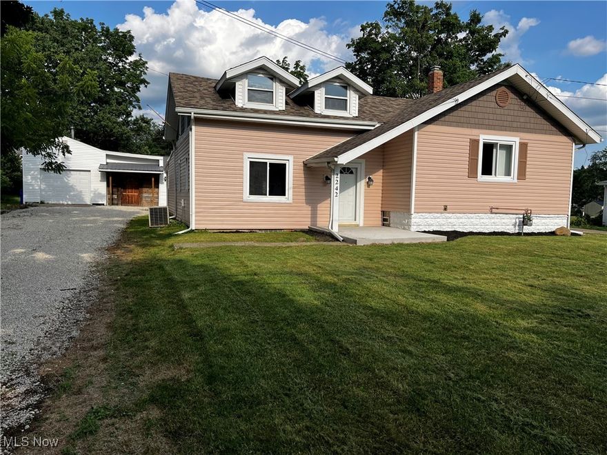 Welcome to 2242 Vincent St in Mogadore. This charming 3 bedroom, 2 bathroom home boasts a spacious kitchen with ample cabinets and counter space, expansive living area and main bedroom with updated ensuite bathroom. Additionally there is another updated full bathroom, main floor laundry room, and upstairs, a potential third and fourth bedroom. The property also features a large one car garage with workshop area perfect for DIY projects and extra storage, well sized backyard and new deck great for outdoor activities.