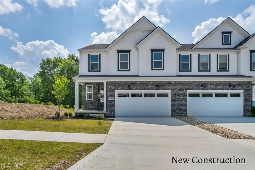 MOVE IN READY! Welcome to your dream home — a trendy, new construction townhome built for modern living and everyday style! Just a 2-minute stroll to Market 42, the area’s newest hotspot for local shopping, craft dining, and vibrant entertainment. Whether you’re sipping coffee from your favorite café or exploring nearby walking paths, you’re right where the action is — with space to unwind when you’re ready to relax. Inside, this Drees homes Libby floorplan stuns with a dramatic two-story family room filled with natural light from floor-to-ceiling windows and a cozy fireplace centerpiece. The open-concept layout flows seamlessly into your gourmet kitchen, complete with soft-close cabinets, quartz countertops, and an oversized island perfect for hosting friends or prepping your favorite recipe. Thoughtful details like a built-in mudroom bench keep your entryway organized, while upstairs you’ll find a spa-inspired primary suite featuring a frameless glass tile shower with bench seating. Laundry? It’s right where you need it — upstairs and easy to access. From the covered outdoor porch to the elevated finishes, this home was made for your lifestyle — stylish, smart, and totally low-maintenance. Live where everything happens. Love where you live.