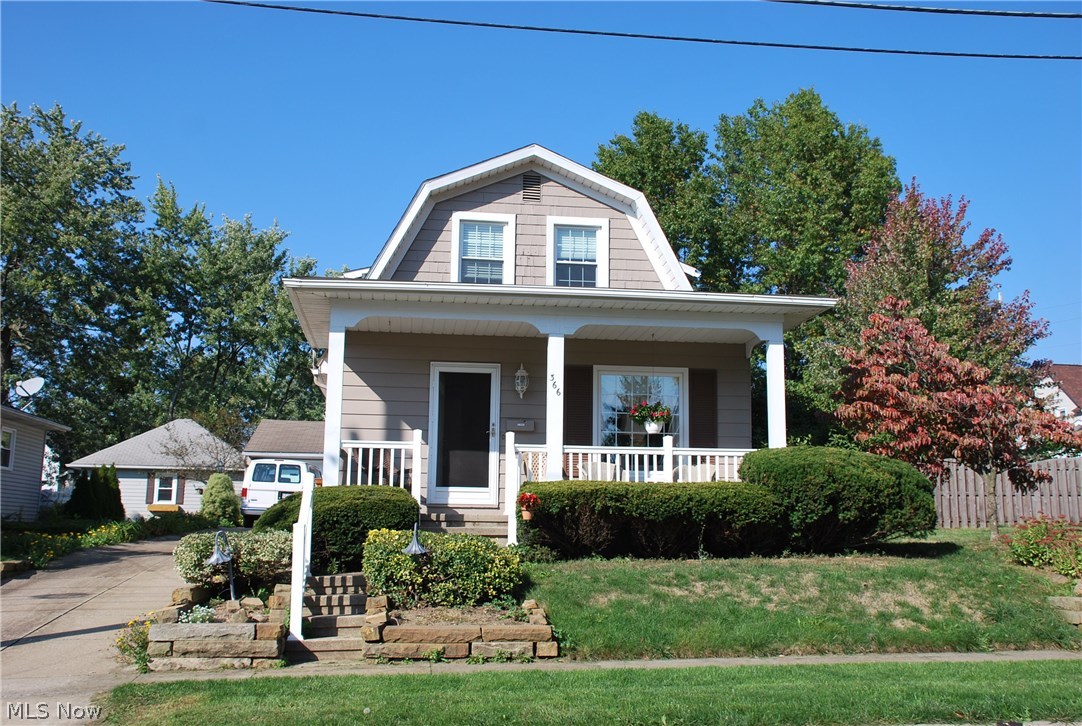 This is your opportunity to buy a great sized home with 4 bedrooms and 3 bathrooms (2 full on 2nd floor with all 4 bedrooms and a half bath on the 1st floor), with a welcoming gorgeous front porch and a large wrap around sun porch with several sliding glass doors on the rear. 2-car garage that is detached has a brand new overhead door and also has a man door on the side. The kitchen has been completely remodeled with beautiful cabinetry refacing, countertops, appliances, lighting, extension for serving or work space and an eat-in kitchen area by the windows. Besides the huge front Living Room, there is an addition in the rear of the home with a gorgeous Family Room with Venetian Plaster and an awesome fireplace. The separate dining room has gorgeous window treatments and wall coverings, is spacious enough for Holiday entertaining & family dinners. The 2nd floor 4 bedrooms and 2 full baths is ready to move in and there is plenty of storage and large closets. The unfinished basement has