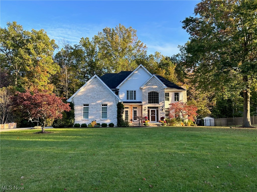 Nestled in a peaceful neighborhood, this Howland School District home provides a wonderful opportunity for those seeking a spacious and well-maintained residence. Prepare to be WOWED by this stately 5 bed, 4 full bath, 3 car garage home. Recent updates include a new water heater in 2016, a new roof and siding in 2021, one central air and one furnace new in 2020, all wooden blinds new in 2019, and a sump pump in 2023. The home also features a spacious eat-in kitchen with granite countertops, stainless steel appliances, & breakfast area. There is also a cozy family room with a gas fireplace & multiple windows with a great view of the backyard. This is a MUST-SEE home; you are going to want to move right in.