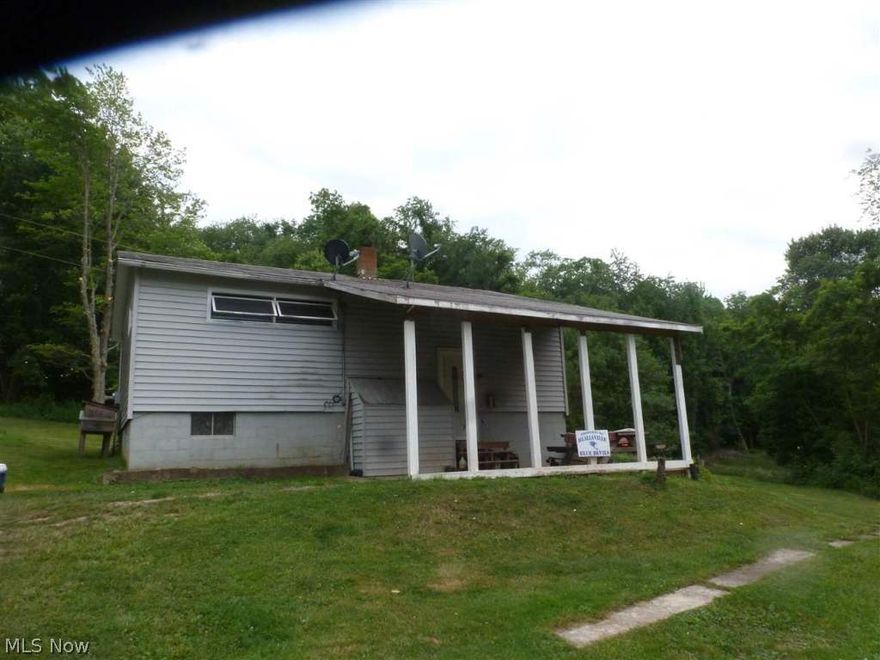 Quaint 2.6 acres in a lovely country setting. The home features 2 bedrooms, one full bath, and living room on the main level. The lower level offers the kitchen, a family room (that could be used as the 3rd bedroom but unfinished), plus the 2nd full bath in the laundry area. Nice large windows in the living room and French doors in the kitchen. Newer carpet and laminate flooring. Seller will retain mineral rights.