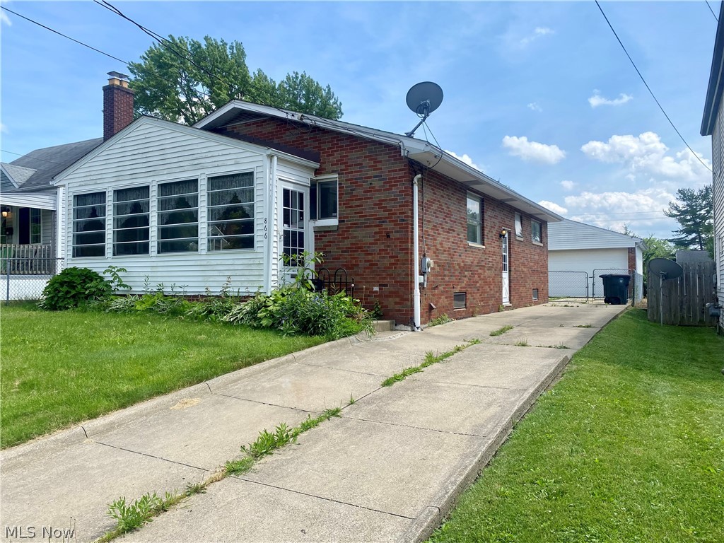 Lovely brick ranch in Firestone Park. This solid home offers endless possibilities. The bright and airy kitchen gives plenty of space to cook or entertain. The darling sunroom off of the living room is the perfect place to sip your morning coffee. Three bedrooms and a full bath complete the main floor. The full basement is a blank canvas. It includes a stand up shower and plenty of space to set up a large rec room or anything you wish. The electrical panel is newer and the washer and dryer stay with the home! The oversized two car garage offers electric, a man door and is any handyman's dream.