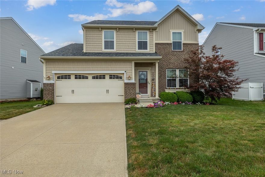 Welcome to 36990 Tail Feather Dr in the desirable Meadow Lakes community of North Ridgeville! This beautifully maintained 4-bedroom, 2 full/2 half-bath Colonial offers over 2,500 sq. ft. of finished living space, including a spacious finished basement.

Step inside to find an inviting layout where the family room flows seamlessly into the eat-in kitchen. The kitchen is enhanced with granite countertops (2019), complemented by vinyl plank flooring (2020). Upstairs, the large master suite includes a recently remodeled bathroom (2021), providing a private retreat. Three additional bedrooms offer generous closet space and natural light.

Major updates bring peace of mind, including a new roof in 2023. Outside, enjoy the fully fenced backyard—privacy fencing along the sides with black ornamental at the rear to highlight the tranquil pond view. A spacious deck is perfect for entertaining, and a 12x10 storage shed adds valuable convenience.

The finished basement features a large recreation room and half bath, creating even more space to enjoy. Additional highlights include a 2-car attached garage, community amenities, and proximity to parks, shopping, and schools.

For added confidence, the seller is including a home warranty through APHW. Don’t miss your opportunity to own this move-in ready home—schedule your showing today!