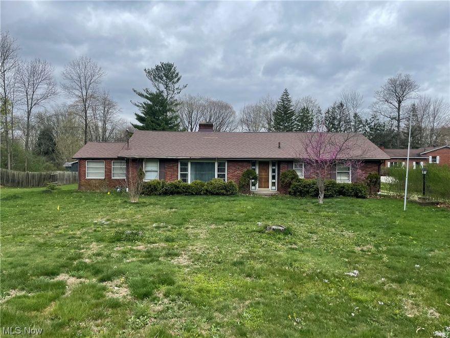 One-floor living is waiting for your personal touch. Welcome home to this charming Ranch offering 3 Bedrooms, and 2 Full Baths on nearly an acre. Enter through the front door to be greeted by an impressive floor-to-ceiling stone wall with a cozy fireplace as your focal point. The owners' suite has a private bath with plenty of counter space, beautiful hardwood floors, and a cedar closet. The kitchen offers many cupboards to handle your storage needs. Enjoy entertaining in the heated, enclosed porch/sunroom off the kitchen with a built-in dry bar. The crawl space has been waterproofed in 2022. A new roof was put on in 2016, and the furnace and air conditioner were replaced in 2010. Call today to schedule your private showing.