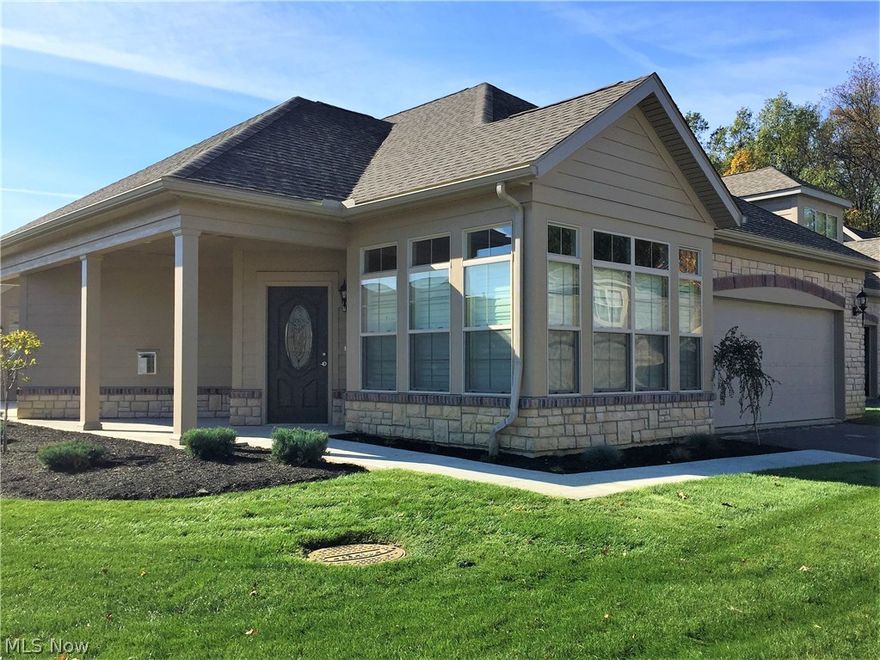 MUST SEE THIS GORGEOUS CONDO!! Priced to sell and move in ready! Enjoy maintenance-free living in this luxurious, stand-alone condo at The Sanctuary at Plum Brook. One of the higher-end models in the association with numerous upgrades and a desirable open layout.  Offering 2 beds, 2 full baths, laundry room, and 2.5 car garage.  Upgrades include an additional “bonus room” off of the main entrance, custom wood front door, custom closets, custom window coverings, and custom lighting equipped with dimmer switches.  The spacious living area accented with amazing dark hard-wood floors and a large gas fireplace.  This flows into the designer kitchen, where you will be captivated by the large island with a custom designed wood panel base, beautiful granite countertops, new stainless-steel appliances, and an oversized pantry.  The spacious master suite with vaulted ceilings has a custom walk-in closet and large tiled master bathroom with double vanity and standing shower.  In addition, the mas