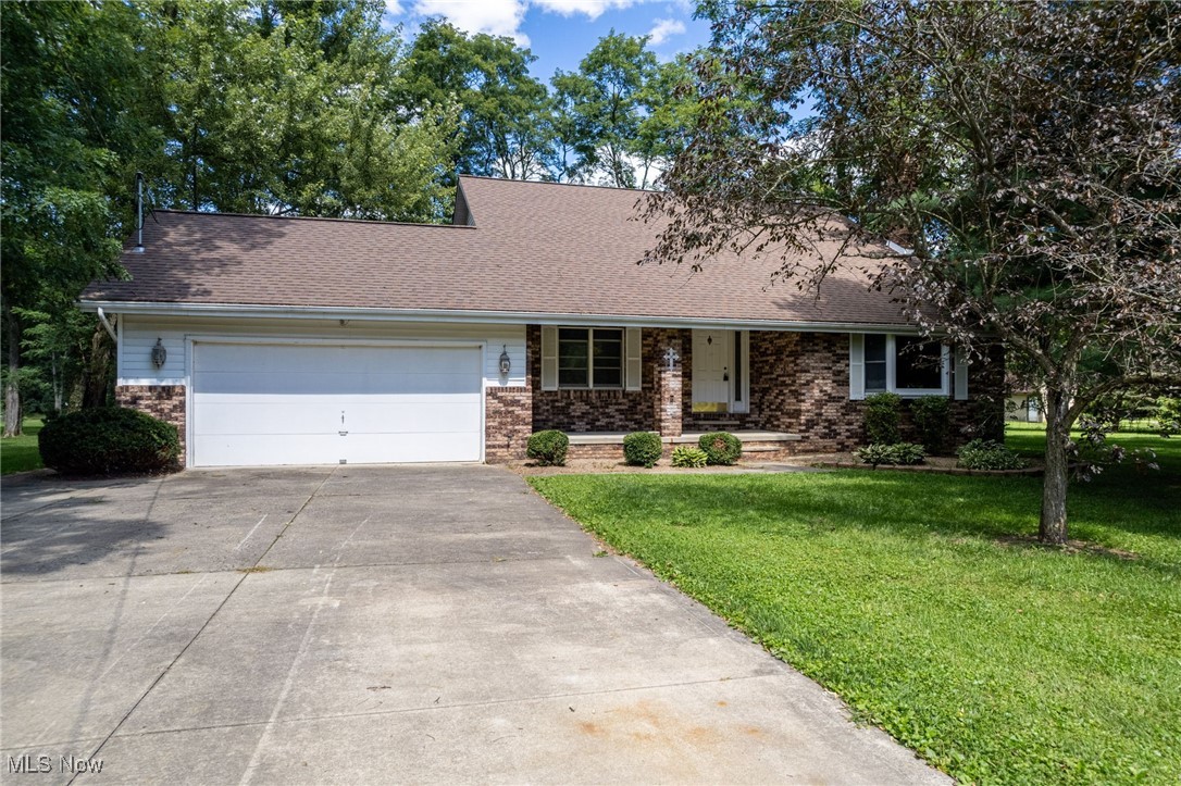 Welcome home to this 4-bedroom, 2.5-bath home on a 1-acre lot in Valley City. Features include a main-floor bedroom, vaulted ceilings, newer vinyl plank flooring, and a cozy brick fireplace. The kitchen opens to a large deck with peaceful backyard views. Upstairs includes three more bedrooms and a full bath. Additional highlights: newer roof and central air, attached 2-car garage, and a convenient yet quiet location near Medina and Brunswick. Schedule your tour today!