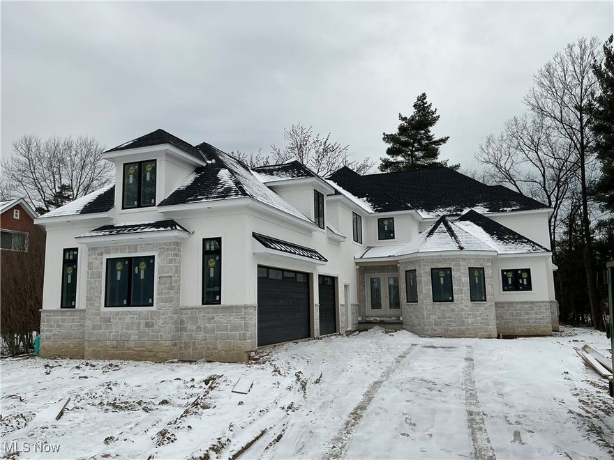 HOME CONSTRUCTION TO BE 100% COMPLETE 3/15/26. NEW PHOTOS/LISTING COMING 3/15/26 WHEN HOME CONSTRUCTION IS 100% COMPLETE! CURRENT SPECIAL PRICING AVAILABLE ONLY IF PURCHASED PRIOR TO 3/15/26 COMPLETION DATE. THIS SPECIAL PRICING WILL NOT BE OFFERED ONCE THE HOME IS COMPLETE AND THE NEW LISTING WILL BE ORIGINAL LIST PRICE. Welcome to 26117 North Woodland located in the heart of Beachwood, located on a quiet cul-de-sac street, presented to you by Dommus Construction, a custom luxury builder. This private sanctuary sits on a beautiful private parcel with quick access of all that Beachwood has to offer. With a March 2026 completion, this stunning high end luxury new construction build is sure to impress. With over 5,000 finished sq ft, 6 bedrooms, 6 baths, and an optional finished basement, this home will offer endless possibilities for you and your family. Call the list agent today for details to set up your tour. This one won’t last on the market much longer! Home is almost complete!