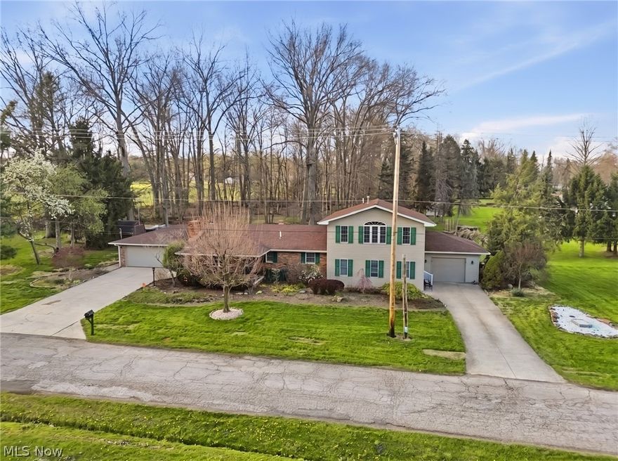 Don’t let this awesome multi-generational layout home with the perfect in-law suite slip away!  Everything on your wish list, plus a peaceful rural vibe close to everything. 

Pride in ownership is evident throughout, with many updates in recent years, incl: all new flooring, HVAC, roof, kitchen, and more. Covered front porch enters to the cozy living room with brick fireplace. Tastefully remodeled eat-in kitchen - KraftMaid cabinets w/ glazed finish, stainless steel appliances, island and pantry. Sliding glass doors lead out to the covered back patio. 

The main section of the home offers 3 large bedrooms, 2 of which have private en-suite bath. The second floor features a massive great room with beamed cathedral ceiling, plus the primary suite- serving as a peaceful hideaway w/ walk-in closet and full bath. First floor laundry with custom cabinets, plus access to the “in-law suite” / full apartment. 

The “in-law suite” / full one bedroom apartment was thoughtfully designed to feel like a separate home- a second driveway & 1 car garage serves this “wing”, . This versatile space is seamlessly integrated with the main home while balancing privacy and independence. Perfect for multigenerational households or generating rental income. Entry from the hallway of the main home or its own dedicated front entry, stepping into the spacious living room/dining room area.  Around the corner, a full kitchen with all appliances, ample counter space, and a cute built-in desk area plus a remodeled bathroom and bedroom with walk-in closet. 

Clean & Dry basement for extra storage.
The peace and comfort found throughout the home continues on the outside , with a park-like backyard setting, tons of patio space, fire pit, and shed with 220 hookup. 
This versatile home has room for everyone and everything- inside and out!