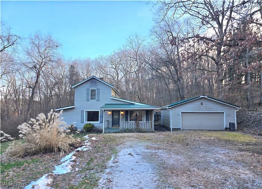 Enjoy peaceful country living just minutes from town in this inviting home filled with potential situated on a nice 1.5 acre lot. The main level features a spacious eat-in kitchen with island that flows into a formal dining room, while the cozy living room offers a comfortable place to relax. This home also boasts a main-floor bedroom, full bathroom, and convenient first-floor laundry room. The upstairs includes two nice size bedrooms. Step outside to a nice, private backyard with covered patio and an older in-ground pool that has not been used recently but may still have potential to restore. Additional highlights include a detached two-car garage, an extra workshop, and storage shed, providing plenty of space for hobbies, tools, and storage. With its desirable layout and generous outdoor space, this property offers a great opportunity to make it your own. Call today for a private tour!