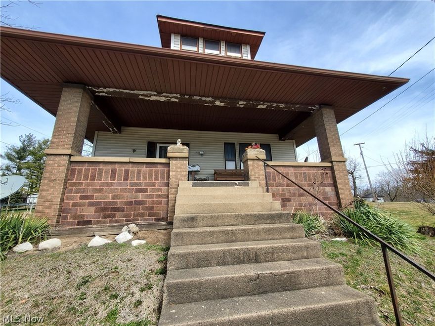 2 car detached garage 24 x 32 built in 1983, w/ electric & heat. AEP electric and Columbia Gas. Rolling Hills LSD. Close to Seneca Lake. With a little TLC this would make great first time home or rental property. Property being sold "as is".