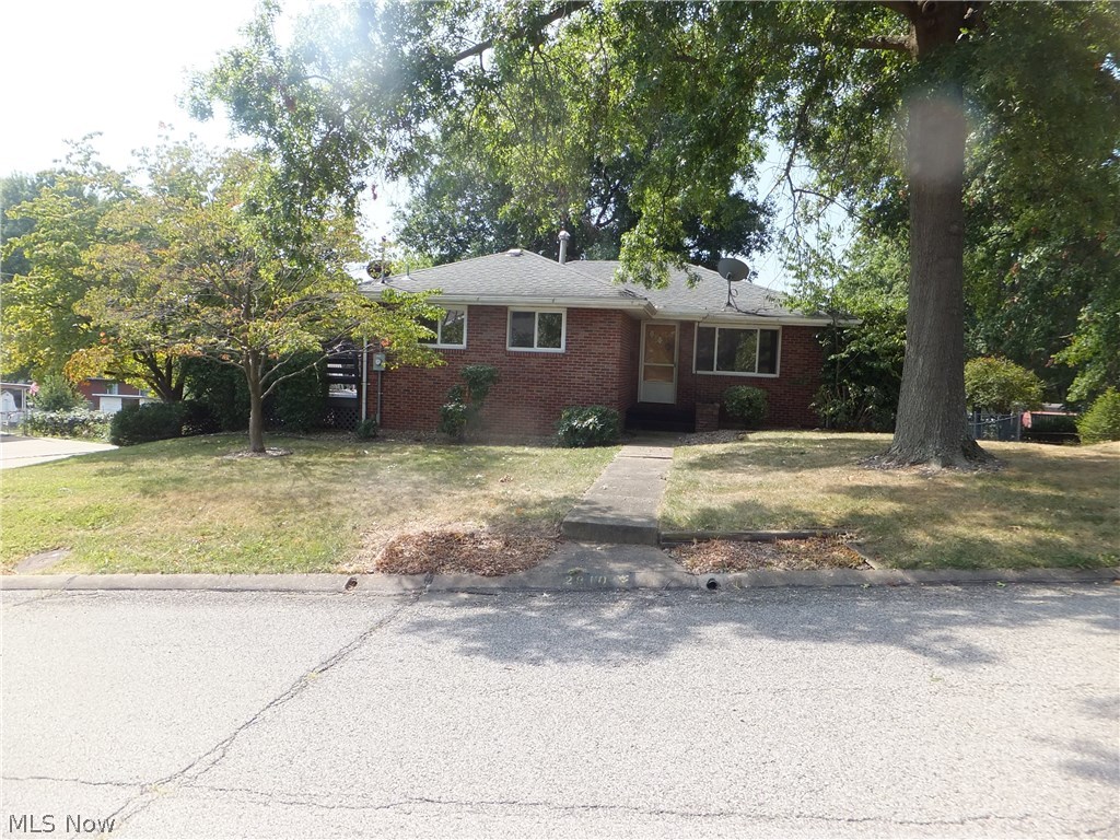 You will love this outstanding Northend location situated on a lovely fenced corner lot. This home is a short distance from City Park & a short hop to catch I-77. The home is all brick, has nice replacement windows, beautiful hardwood floors & ceramic tile kitchen countertops & flooring. There is a woodburning stove in the basement rec room as well as a 2nd full bath. The garage while only a single door is as wide as a double garage.