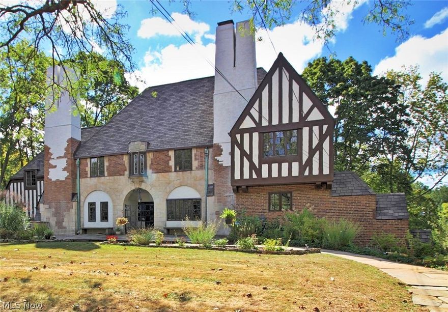 Incredible tudor with priceless views of the Shaker Lakes. This grand residence has been exquisitely restored with fine upgrades throughout. Immaculately maintained with original architectural features including: detailed plaster ceilings, intricate leaded glass, beautiful woodwork and wall sconces. Impressive 2 story library with leaded glass Palladian windows overlooking the lake. Stunning chef’s kitchen with stainless steel appliances, granite, upgraded cabinets, subway tile, and a convenient pasta water faucet above the gas cooktop. All new gorgeous bathrooms. Updated roof and mechanicals including electric and plumbing. Backyard with a new flagstone patio. All work has been completed, just move in and enjoy! 

Shaker Heights is one of the most sought after cities in Cleveland - tranquil, yet cosmopolitan and distinctive suburb. The City has a national reputation for excellence in city services, architecture, natural beauty and superior public education. Less than 25 minutes to d