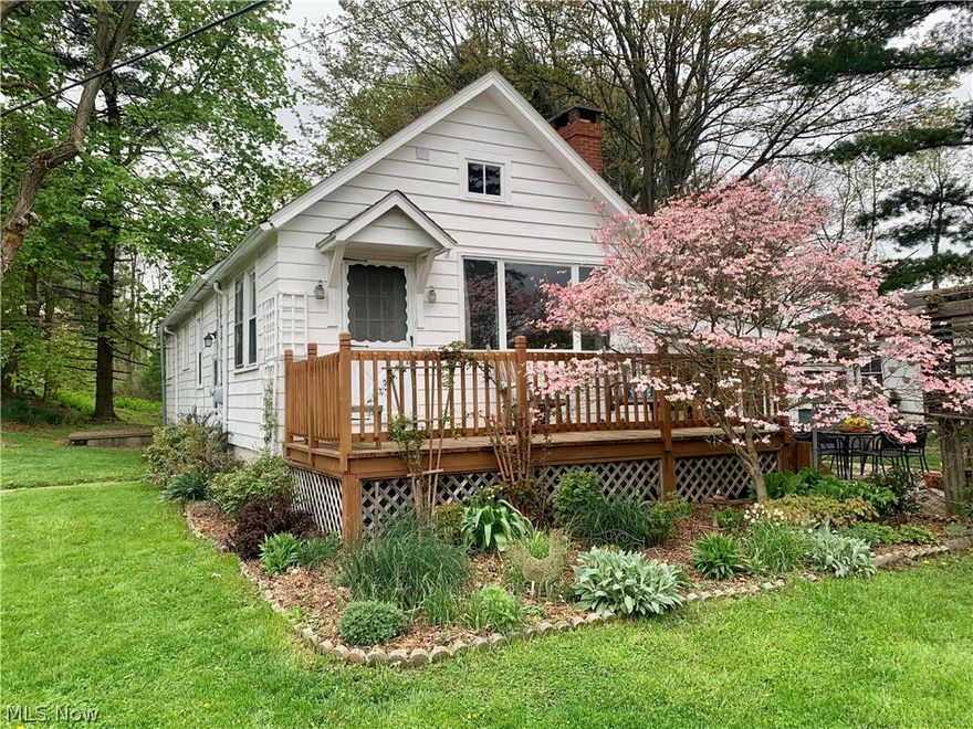 A HIDDEN GEM! Country living just minutes from town and conveniently located on a quiet, dead-end street with easy access to highways. This charming home features 3 bedrooms, 2 full baths, a nice living room with fireplace and hardwood flooring, a large eat-in kitchen with pantry, newer full bath, and a relaxing sun room that overlooks the large patio perfect for summer barbecues. The third bedroom could also be used as an office. Step outside and enjoy nature, situated on 1.78 acres, including lots of shade trees, a treehouse, grape arbor, wild berries, raised planting boxes and a small asparagus patch. This property also has a massive detached 2-car garage with an additional carport and a loft perfect for an additional recreation space of your choice. At the rear of the property is a storage shed with workshop and a serene fire pit area. This home has endless possibilities. Schedule your showing today, as you won't want to miss out on this unique property!