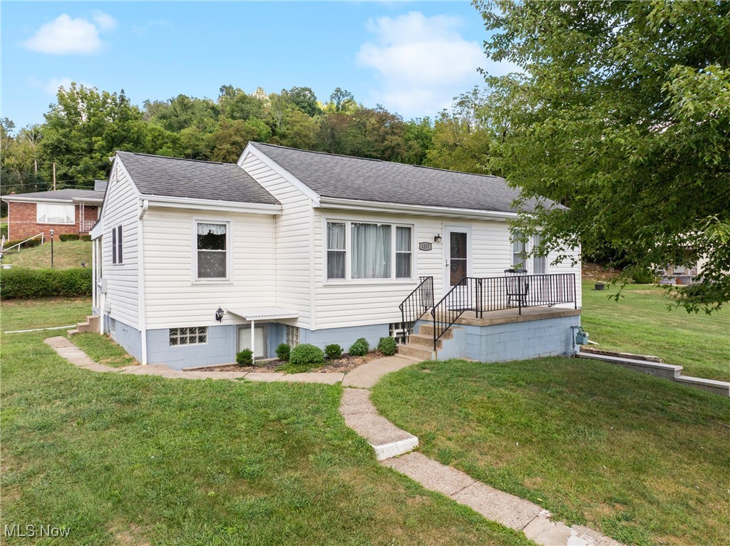 Welcome to this well-maintained 3-bedroom, 2-bathroom home situated on a spacious .32-acre corner lot in a quiet residential neighborhood. This property offers flexible living with a first-floor owner’s suite, partially finished basement that could serve as a 4th bedroom or rec room, and wheelchair accessibility via a ramp to the back entrance. Featuring a bright living room and functional kitchen, there is also a dining room with french doors leading to the covered back porch. If needed, this dining room could also be transformed into yet another bedroom! The primary suite includes a private en-suite bath, while two additional bedrooms share a second full bath. Downstairs, the partially finished basement adds valuable living space and an abundance of storage space. Additionally, this home includes a sump pump and a radon mitigation system, offering peace of mind and added safety. Finally, enjoy the outdoors on this generously sized corner lot with space for entertaining, gardening, or future expansion. Move-in ready and thoughtfully designed for comfort, accessibility, and flexibility — don’t miss this unique opportunity!