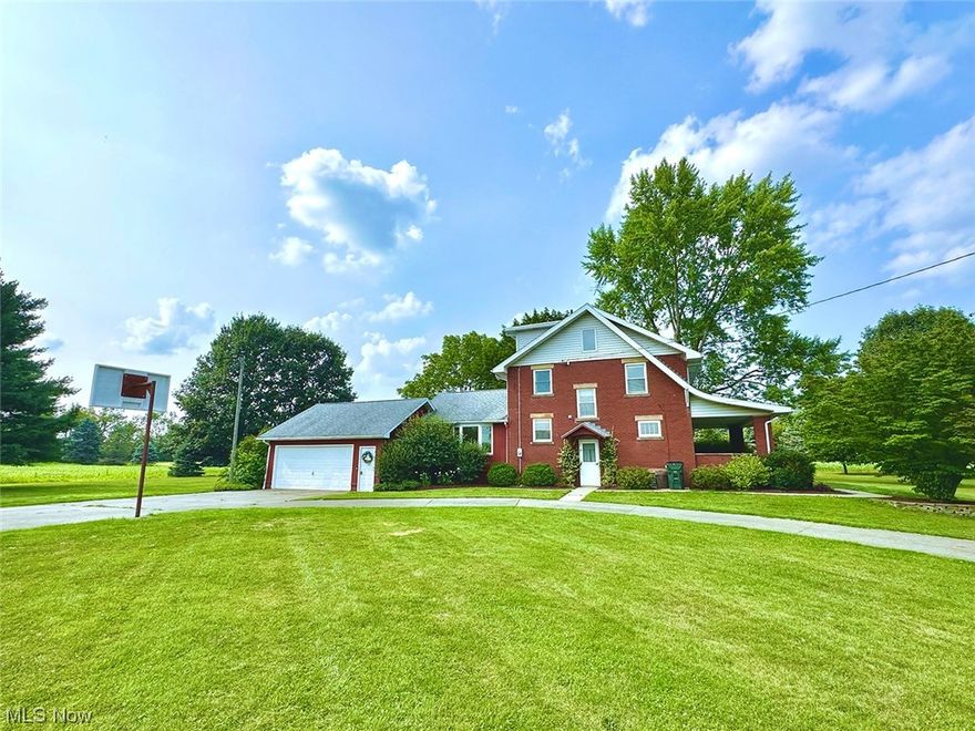 Beautiful hideaway setting with 25.5 acres (two parcels). Free gas from neighboring oil well plus Dominion Gas from the street. Brick two-story home with finish third floor. Three bedrooms and a full bath on the second floor. Nice custom kitchen with granite counters, breakfast island (movable), front living room, covered front porch, living room, and large dining room with hardwood floors leading to the rear covered patio and deck. Two-car attached garage. Full basement with laundry, updated gas furnace, and central air. 32 x 48 block foundation barn with stud walls, 6” floor, two overhead doors, 100 amp service, built-in 1997. Great location just south of town, near the YMCA & Metzger Park. Louisville schools. This property has woods, water, and tillable land, plus peace and quiet.