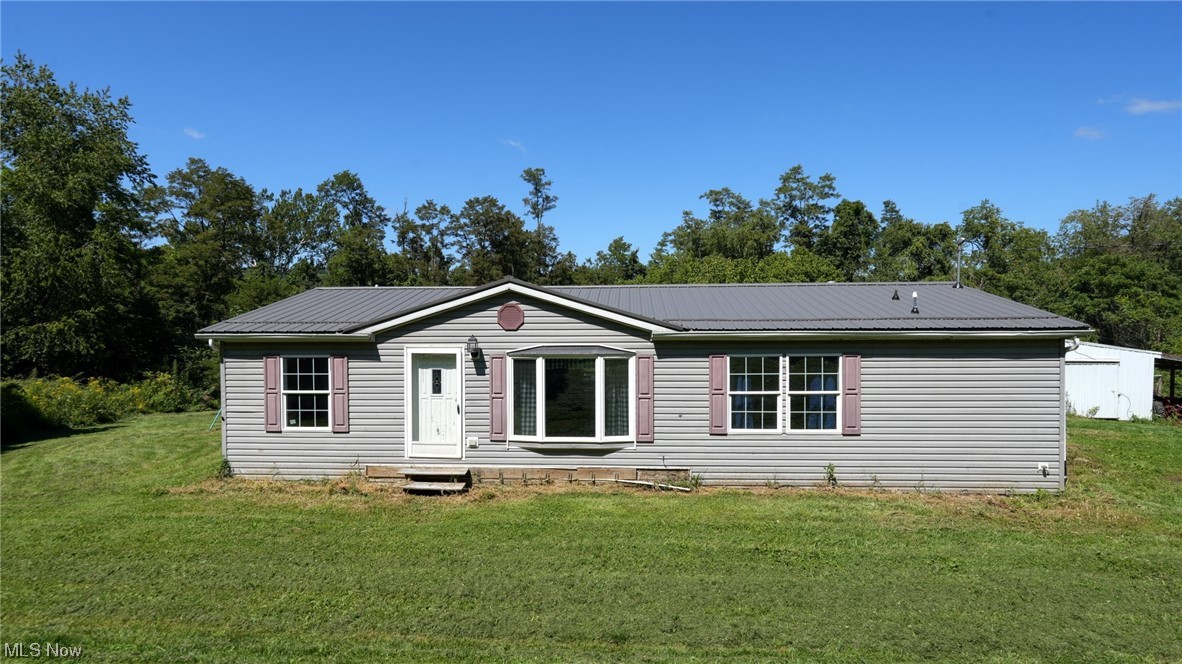 Country Living at its finest!! 3 bed 2 bath ranch home built in 2006 on a secluded 5.2 acres in Liberty township. Open floor plan 1344 sf with main floor laundry! Sizable kitchen with tons of cabinet storage and counter space. Stainless steel appliances stay with the home. Master suite with garden tub and stand up shower. 40x60 barn for your animals and equipment. Partially finished and full walkout basement with poured walls and 2 gas heaters!