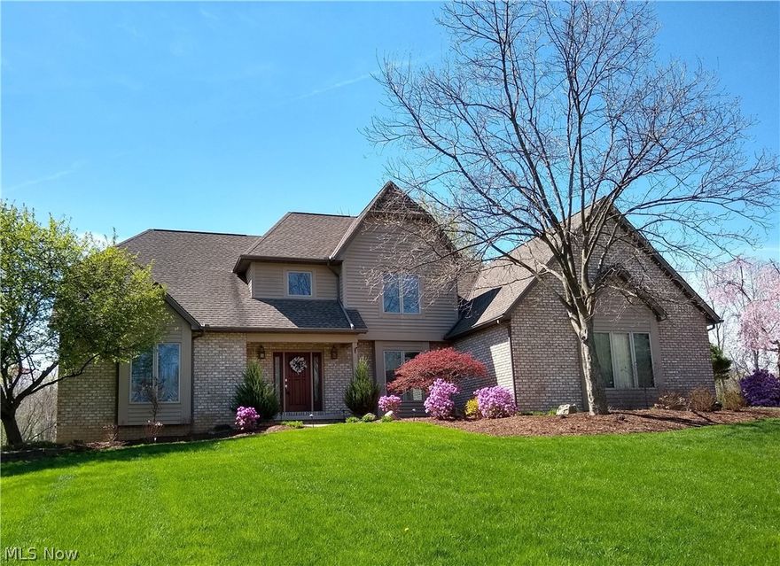 Custom Built Contemporary Colonial Home located on a 1.03 Acre Lot in the Prestigious Champion Creek Farms subdivision, Montville Twp, Medina County, Ohio! This beautiful home features a central Great Room with a Wood Beamed, Vaulted Ceiling & Brick Gas Fireplace w/French Doors opening to a private Den/Office. Step up to a Bright, Entertaining Family/Sun Room w/Windows on 3 sides, Custom Crafted Vaulted Wood Ceiling, Wood Cabinets & Flooring, Built-in Entertainment Center w/Speakers & Walk-up Bar w/Wine Cooler - expanding outdoors onto a 591 sq. ft. Wood Deck w/Covered Cabana. Spacious Gourmet Kitchen w/Custom Cabinets, Island w/Counter Top Stove & Hood, Granite Counter Tops, Desk & Stainless Steel Appliances w/efficient access to a Morning Room w/Vaulted Wood Ceiling, Wet Bar & Formal Dining Room w/Tray Ceiling & Crown Molding. First Floor Master Bedroom Suite w/Tray Ceiling & Glamour Bath w/Dual Sinks, Whirlpool Tub, Separate Shower & Walk-in Closet. The Upper Level has 3 Bedrooms -