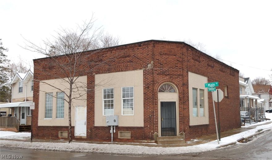 Commercial Retail Space 1,600 sqft plus additional storage area available in basement. Building has great store front potential, could be sectioned off into two separate store fronts. One full bath, and currently plumbed for a second bathroom. Furnace serviced in 2015, Water heater installed in 2014. Roof recently patched. Two updated electric panels, only box A currently hooked up.
