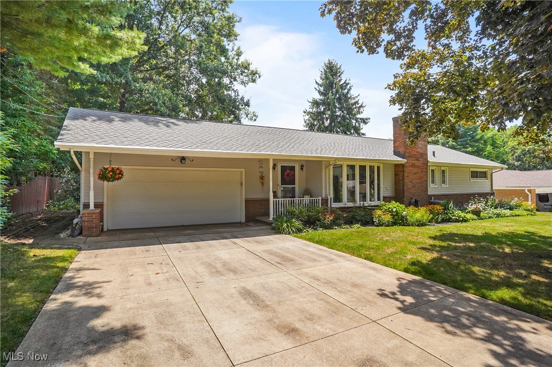 Welcome to 321 Ormsby Rd, a charming Ranch located in the heart of Fairlawn, Ohio. This beautiful property, built in 1957, offers a perfect blend of classic design and modern amenities. With 1,677 square feet of living space, this home features three spacious bedrooms and two and a half bathrooms. As you step inside, you'll be greeted by a warm and inviting living room that boasts a gas fireplace, Bow Window, and sky lights that flood the room with sunlight. The home offers a well-appointed kitchen, updated in 2021 with white cabinetry, quartz counter tops, and glass backsplash. The dishwasher, microwave, range/oven, and refrigerator were all purchased in 2024. In 2022 the hardwood floors were re-stained, adding to the home's warmness and character. The formal dining room is perfect for family dinners. One of the standout features of this home is the sunroom with a gas fireplace that can be enjoyed all year round. The huge recreation room offers ample space for entertainment and family activities. The laundry room comes complete with washer and dryer. The equally impressive exterior of the home boasts a large 0.35-acre. lot that includes a brick patio, garden swing, pergola, garden shed, and mature landscaping. The property also offers an attached two-car garage for convenient parking and storage. Added updates to the home include a new roof and skylights, a sump pump in 2020, a water heater in 2022, front bow window and blinds in 2024, and A/C in 2019. Located in a peaceful neighborhood, 321 Ormsby Rd offers easy access to local amenities, schools, and parks, making it a perfect place to call home. Don’t delay. Call your favorite agent for a private showing today.