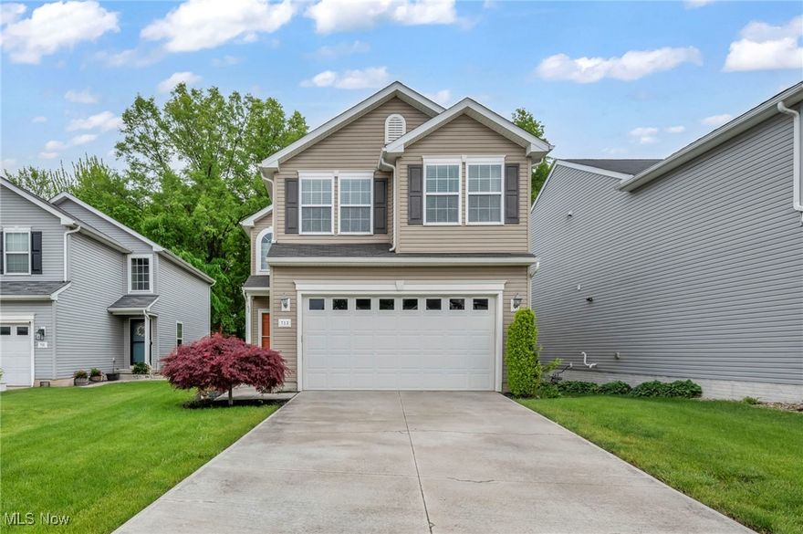 Exceptional opportunity awaits with this spacious 4-bedroom, 2.5-bath light-filled newer colonial, ideally situated on one of the most premium, private lots in a highly desirable community. This special home backs to a tranquil tree line and features a fully fenced backyard for privacy. Step into a beautifully upgraded interior with soaring 9-foot ceilings on the main level, and enjoy the airy, open floor plan that includes a breathtaking kitchen with raised panel cabinetry, crown molding, stainless steel appliances (all included), a chef’s island with breakfast bar, walk-in pantry, and added recessed lighting. The adjacent great room is the perfect place to unwind with a cozy fireplace and peaceful backyard views, while the stunning all-season sunroom offers direct access to a maintenance-free composite deck—perfect for entertaining or relaxing in nature. Oversized first-floor laundry room is a dream, with ample work space, additional storage, and utility tub. Upstairs, you'll find generously sized bedrooms, including a luxurious owner’s suite with a walk-in closet, views of the private backyard, and an ensuite bath with dual sinks, comfort-height vanity and walk-in shower. Bonus second-floor loft area offers flexibility for a media room, home office, or study space. A desirable garden-style full basement with natural light, a window, high-efficiency furnace, and roughed-in plumbing for a future bath tie this home together—ready for your custom finishing touch. Located just minutes from restaurants, highways, and shopping, and within one of the area's top-rated school systems. Don’t miss your chance to own this beautiful home in the sought after Northpointe Estates Development!