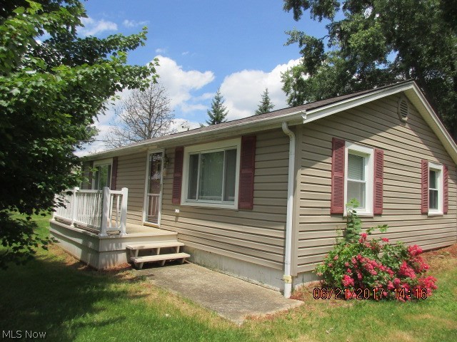 Cozy ranch style home offers large lot, attached garage, covered patio, 30x30 detached garage, deck & central air.