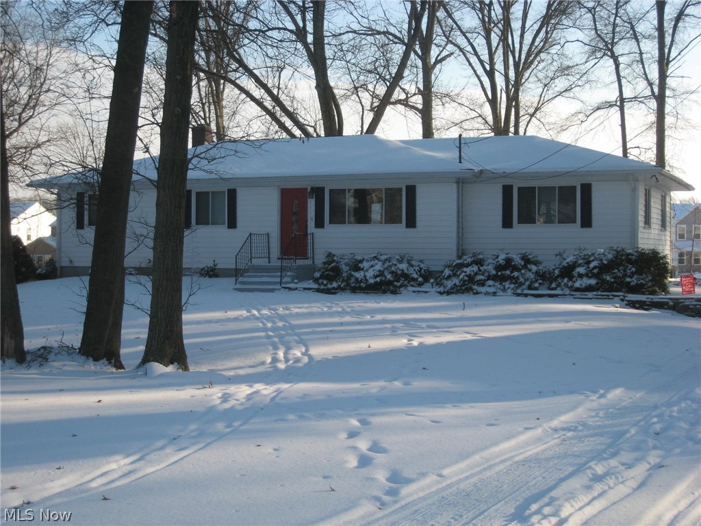 Welcome to this exceptional ranch! Beautifully refinished hardwood floors catch you eye as you enter the front door. Natural light softly filters through the newer windows throughout. Amazing 24 x 16 family room is waiting for your large flat screen TV and entertainment system. Thinking about theater chairs or a spacious sectional? No worries, it will all fit. The fully applianced kitchen with ample counter space and dining area are just steps away overlooking the private back yard and deck with new railings and stairs down to the yard. The master bedroom features a triple closet with organizer system and its own half bath, recently remodeled with vanity, sink, lighting and flooring. Two other nice size bedrooms each with double closets. The main bath is completely updated with beautiful tile and glass tile insert, vanity with Kohler bowl sink perched on the granite countertop, lighting and wood grain tile floor. Other improvements include furnace-2007, hot water tank-2010, 200