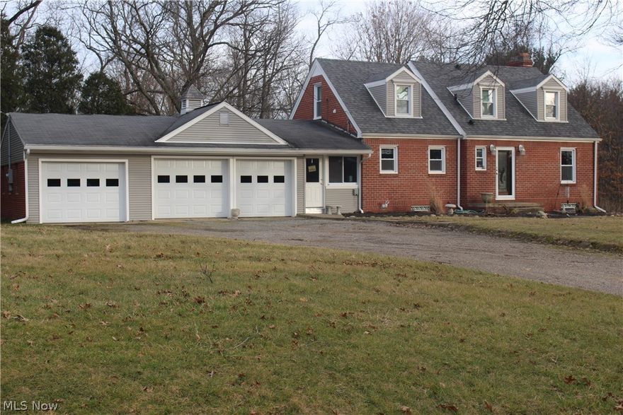 Perfect location for a home business. Large master suite on the 2nd floor and plenty of office space on the 1st floor. Hardwood floors. and a large list of updates. Furnace, C/A siding, kitchen cabinets, heated floors in the kitchen and the master bath. Garage and entry doors, electric wiring and panel, plumbing and windows to mention a few. 3 car garage and 1.99 acres. Call to see soon.