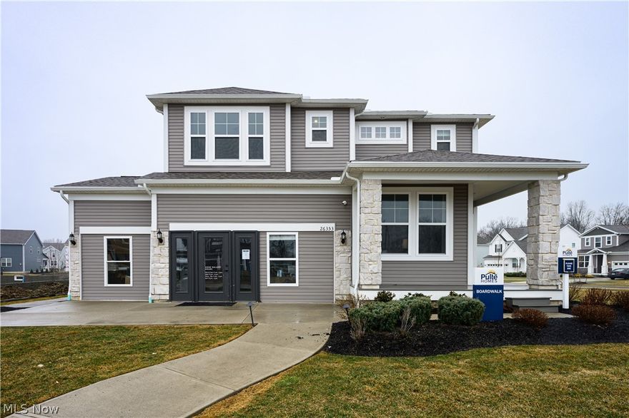 Stunning 4 Bedroom/2.5 Bath MODEL HOME in Olmsted’s desirable Preserve community! This meticulously maintained model home features a large kitchen with quartz countertops and stainless-steel appliances, flowing into a bright family room equipped with a stone fireplace.  The 3rd car garage adds an expanded driveway and extra space for storage. The second level boasts carpeting and an expansive master suite featuring a large walk-in closet and private suite bath. Outdoor living is elevated by an expansive maintenance free lighted deck. Located in a top-rated school district just minutes from Downtown Olmsted Falls and Crocker Park, this move-in-ready gem combines premium upgrades with an unbeatable location. Schedule your private showing today!