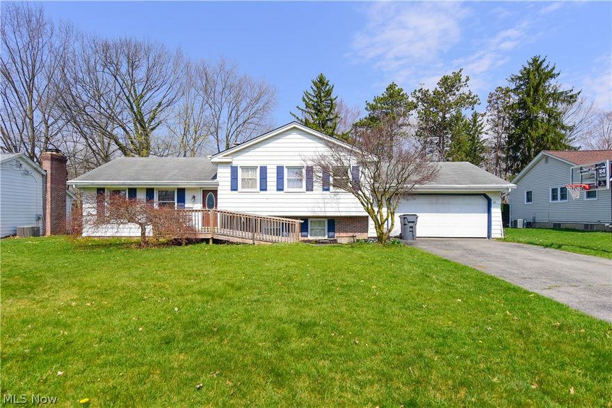 Short Sale!!  Beautiful split level home is located within highly desired area of Boardman. This home features large living room with dining area, spacious kitchen with plenty of cabinetry for extra storage. Enclosed sun room overlooking private wooded backyard and partially fenced for the inground pool. Three bedrooms with wood floors and a full bathroom upstairs. On the lower level you will find a spacious family room with a gas fireplace for all of your entertaining needs. Fall in love with all the potential this home has to offer you. Call today to set up a private showing!