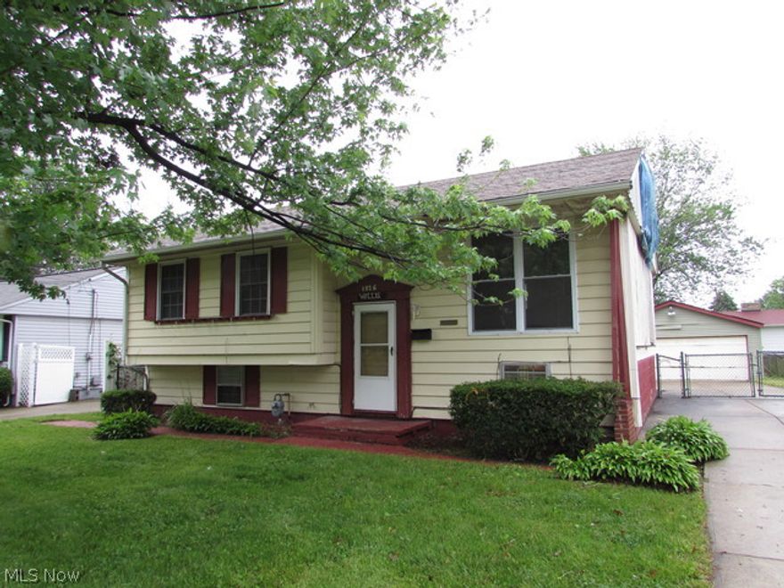 Lots of potential found in this 3 bedroom bi-level style home! Large living room. Spacious neutral kitchen with lots of cabinets and counter space. Nice sized bedrooms. Don't miss the two car detached garage too! Being sold as-is. Call today to schedule a tour!